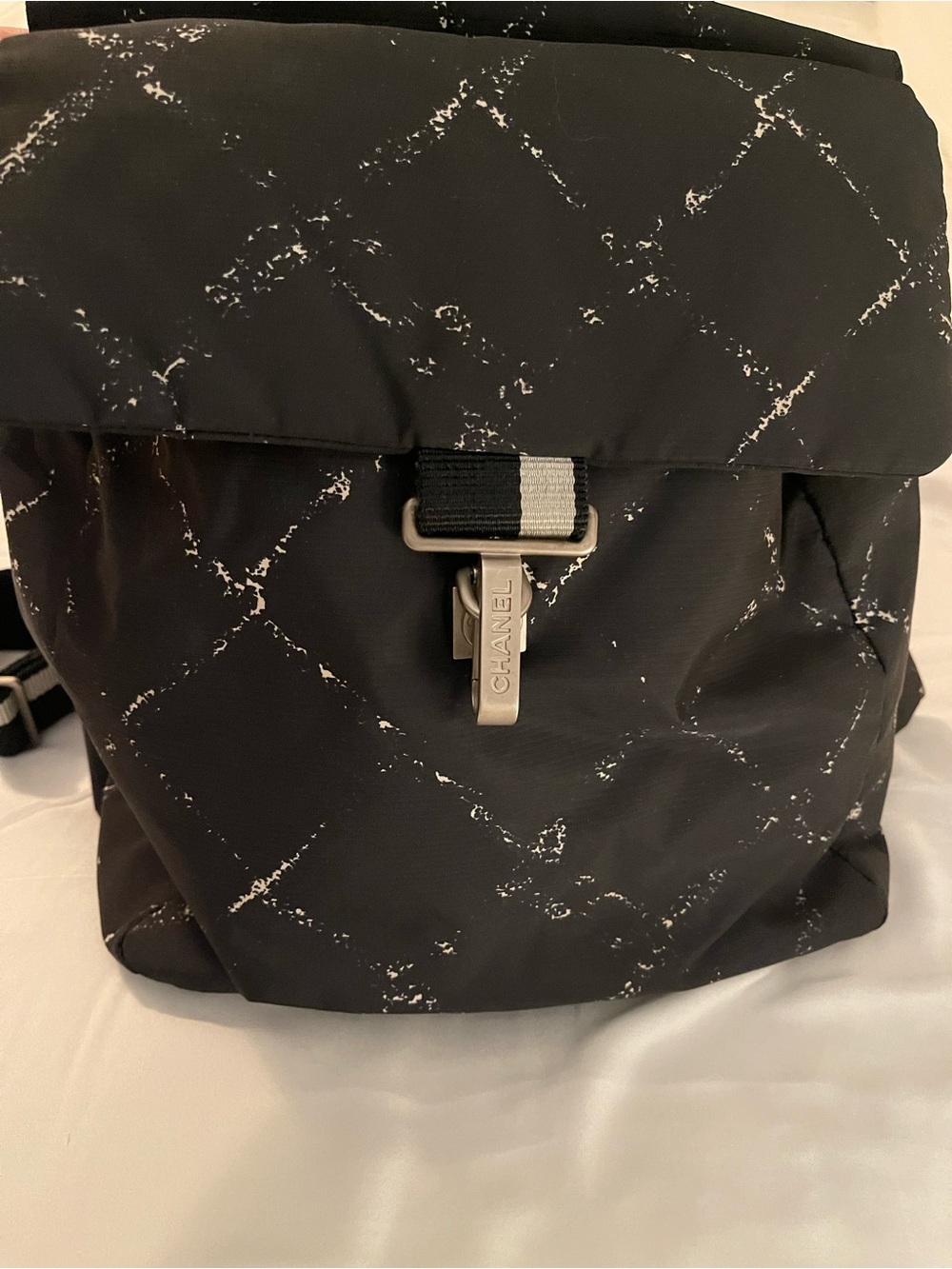 CHANEL Black Nylon Quilted-Print Backpack with Silver Hardware